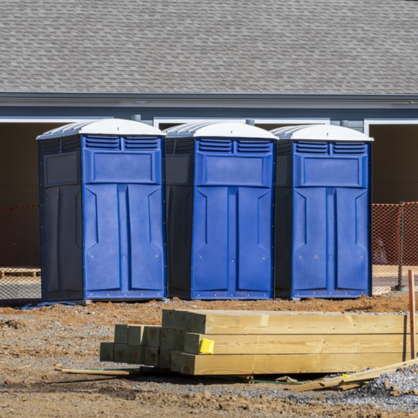 what is the cost difference between standard and deluxe porta potty rentals in Dunbar